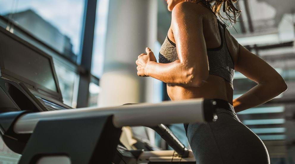 Lady running on a treadmill